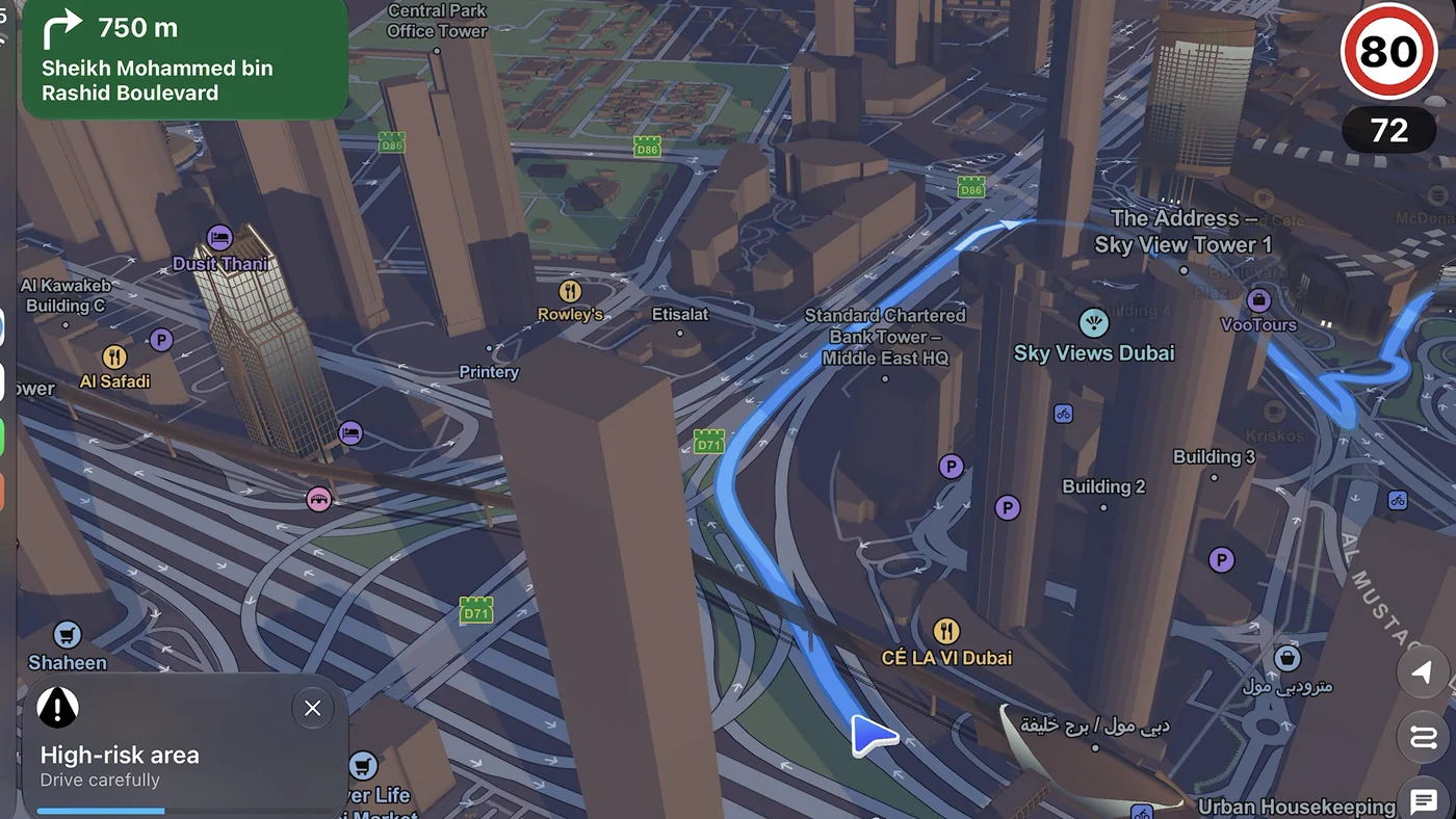 Guardian AI on CarPlay: 3D Downtown Dubai towers with a turn card for Sheikh Mohammed bin Rashid Boulevard and a 40 km/h limit