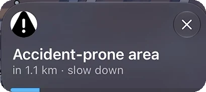 CarPlay alert: accident-prone area in 1.1 km, slow down