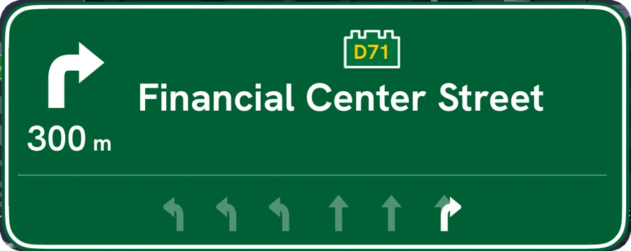 Motorway sign: Financial Center Street in 300 metres, with lane arrows
